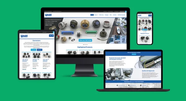 A fully responsive website that has been made to work across all sizes of device. This one is being displayed on a smartphone, a tablet, a laptop and a desktop computer.